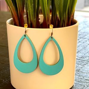 Small turquoise cutout.Small tarnish on hook,otherwise in great condition.